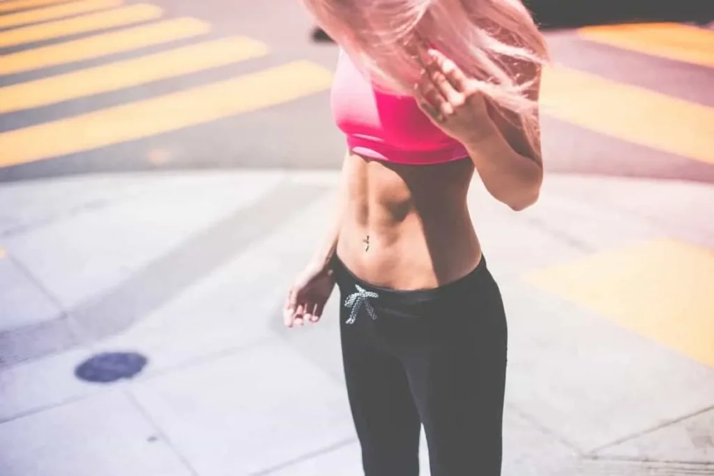 Woman with toned stomach after LA-EMS Body Sculpting Treatment Hertfordshire